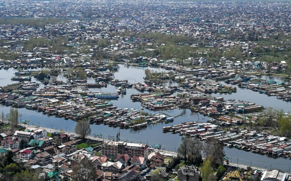 A general view shows the city and its houseboats from the top of the mountain during a government-imposed nationwide lockdown in Srinagar on April 3, 2020. (AFP)