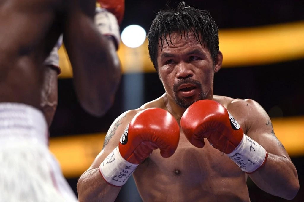 Despite his popularity, Manny Pacquiao trails the front-runners in opinion polls that have been topped consistently by president’s daughter, Sara Duterte-Carpio. (AFP)