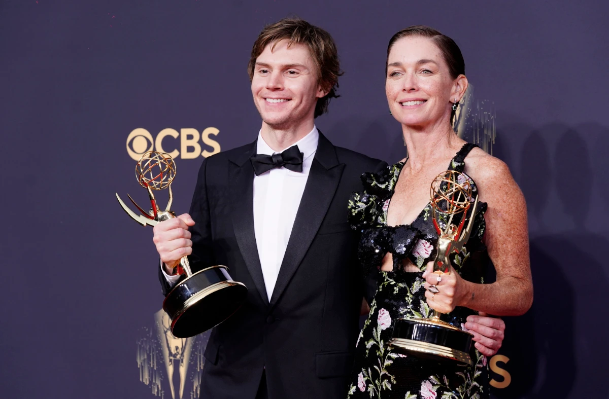 Evan Peters, left, and Julianne Nicholson pose for a photo with the awards for outstanding supporting actor and actress in a limited or anthology series or movie for "Mare of Easttown" on Sunday, Sept. 19, 2021 in Los Angeles. (AP)