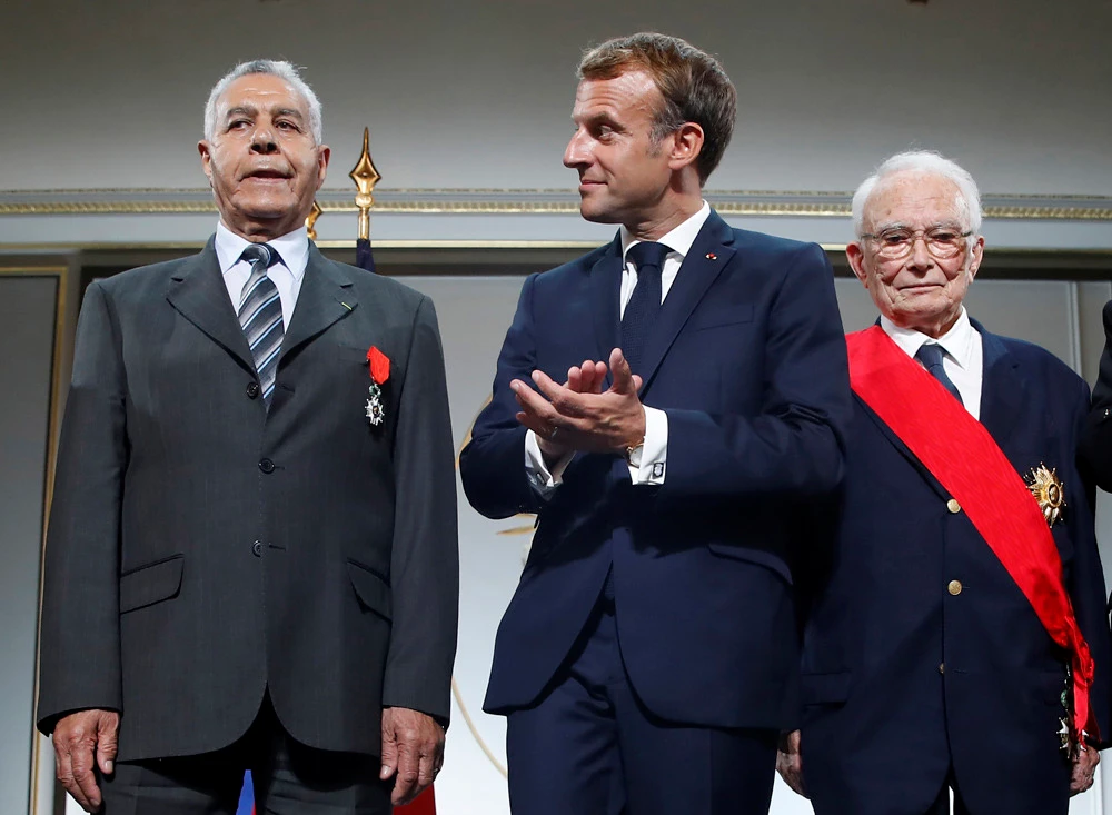 Macron apologizes for French treatment of Algerian Harki fighters