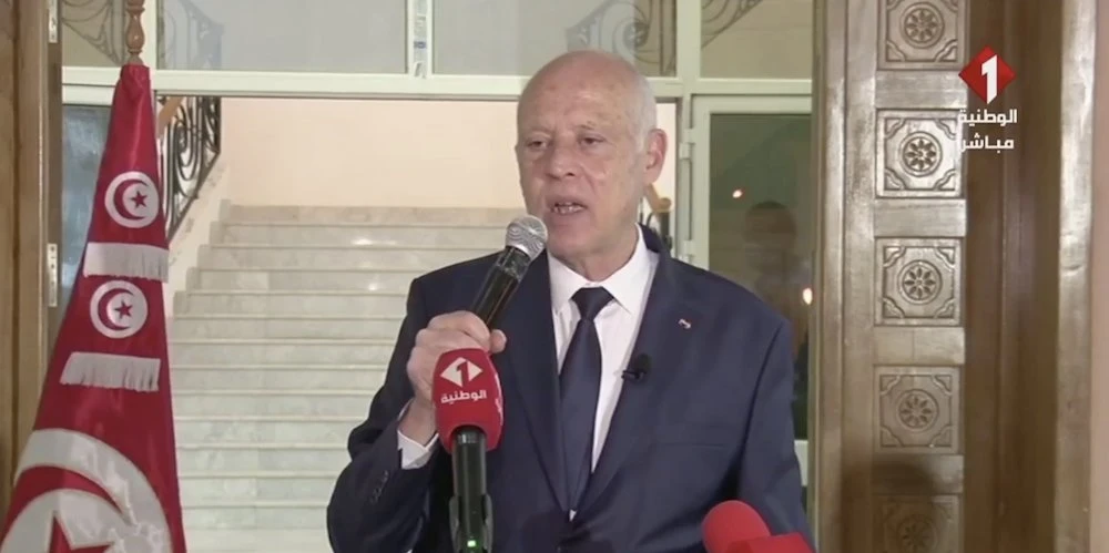 Tunisia’s president says he will change electoral law, appoint PM