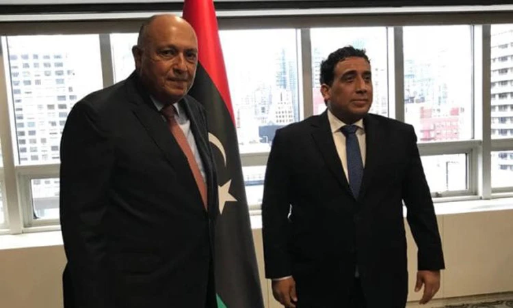Egypt’s Foreign Minister Sameh Shoukry, left, meets with President of the Libyan Presidential Council Mohamed El-Menfi. (Twitter Photo)