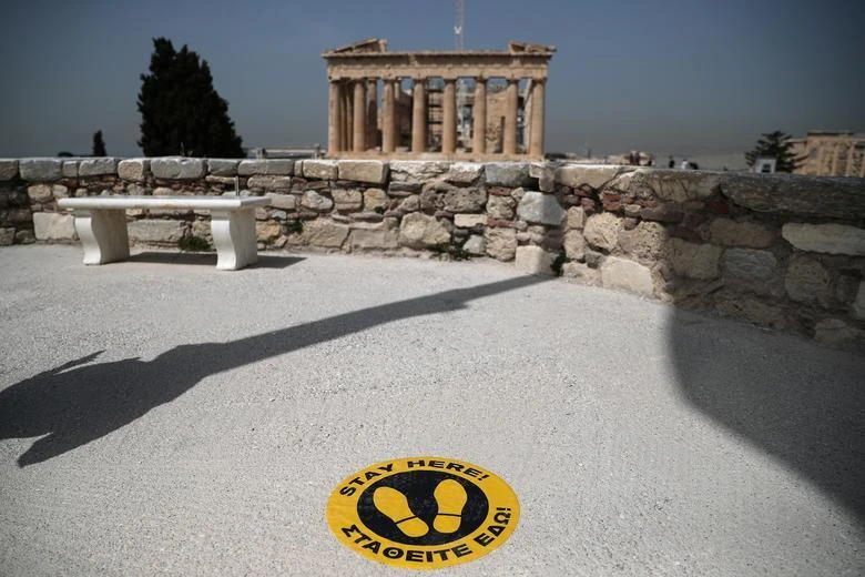 A social distancing marker on the Acropolis with the Parthenon in the background, Athens, Greece, May 18, 2020. (Reuters)