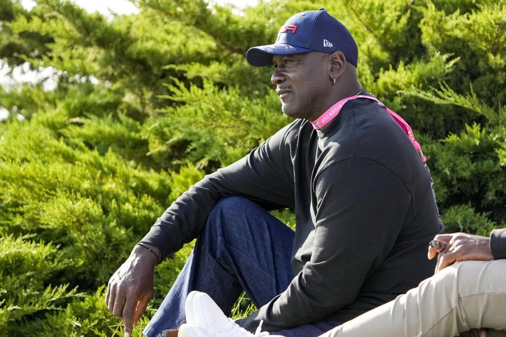 Michael Jordan watches at the 11th hole during a four-ball match the Ryder Cup at the Whistling Straits Golf Course Friday, Sept. 24, 2021, in Sheboygan, Wis. (AP)