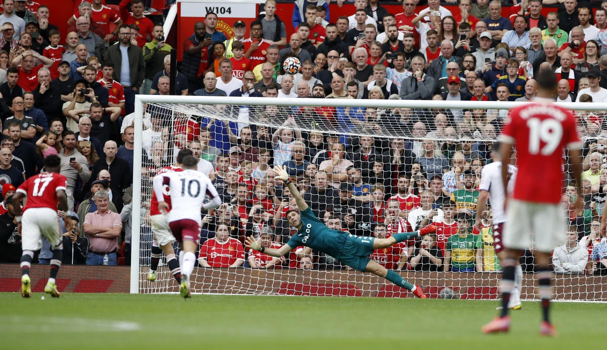 Manchester United’s Bruno Fernandes misses a penalty against Aston Villa that defeated United at the Old Trafford on Saturday. (Reuters)