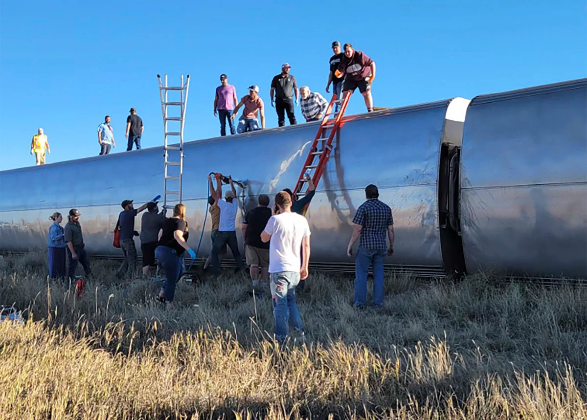 People work at the scene of an Amtrak train derailment on Sept. 25, 2021, in north-central Montana. (Kimberly Fossen via AP)
