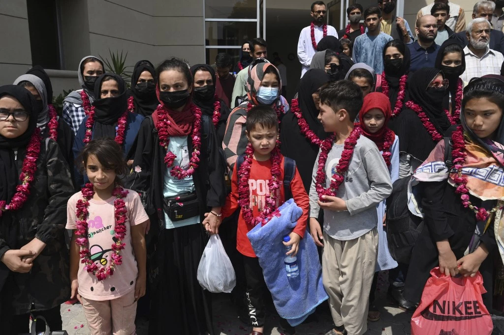 Members of Afghanistan's national girls football team arrive at the Pakistan Football Federation (PFF) in Lahore. (File/AFP)