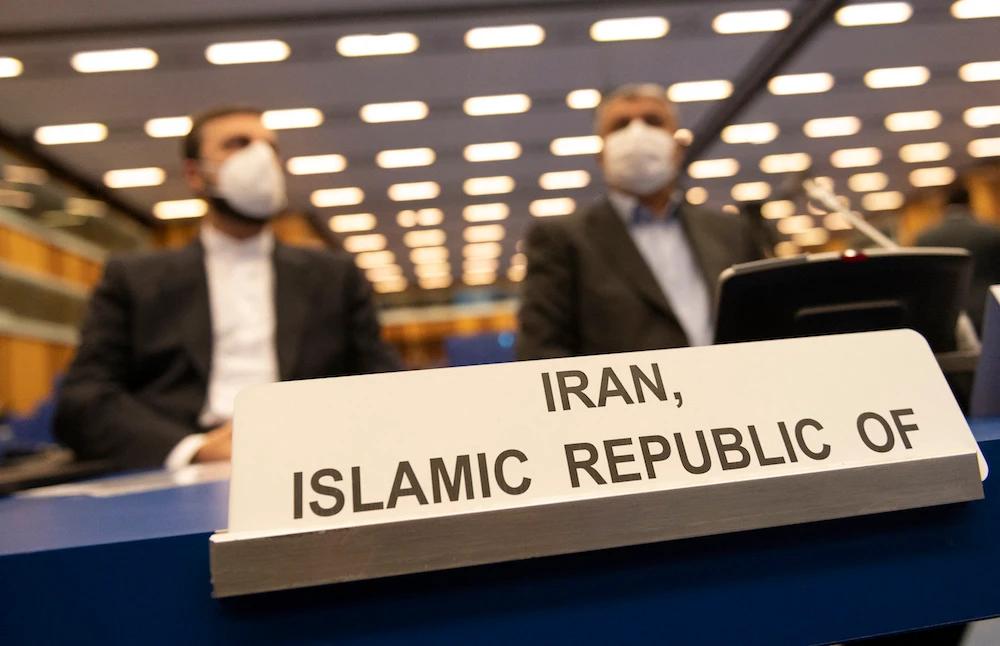 The chief of Iran’s Atomic Energy Organization Mohammad Eslami (R) and Iran’s Governor to the International Atomic Energy Agency Kazem Gharib Abadi attend an annual meeting of all IAEA member states in Vienna, Austria on Sept. 20, 2021. (AFP)