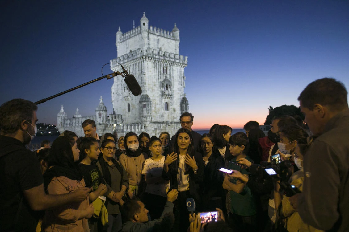 Farkhunda Muhtaj, the captain of the Afghanistan women’s national team, talks to the media after meeting her teammates at a park by the Tagus river in Lisbon on Wednesday. (AP)