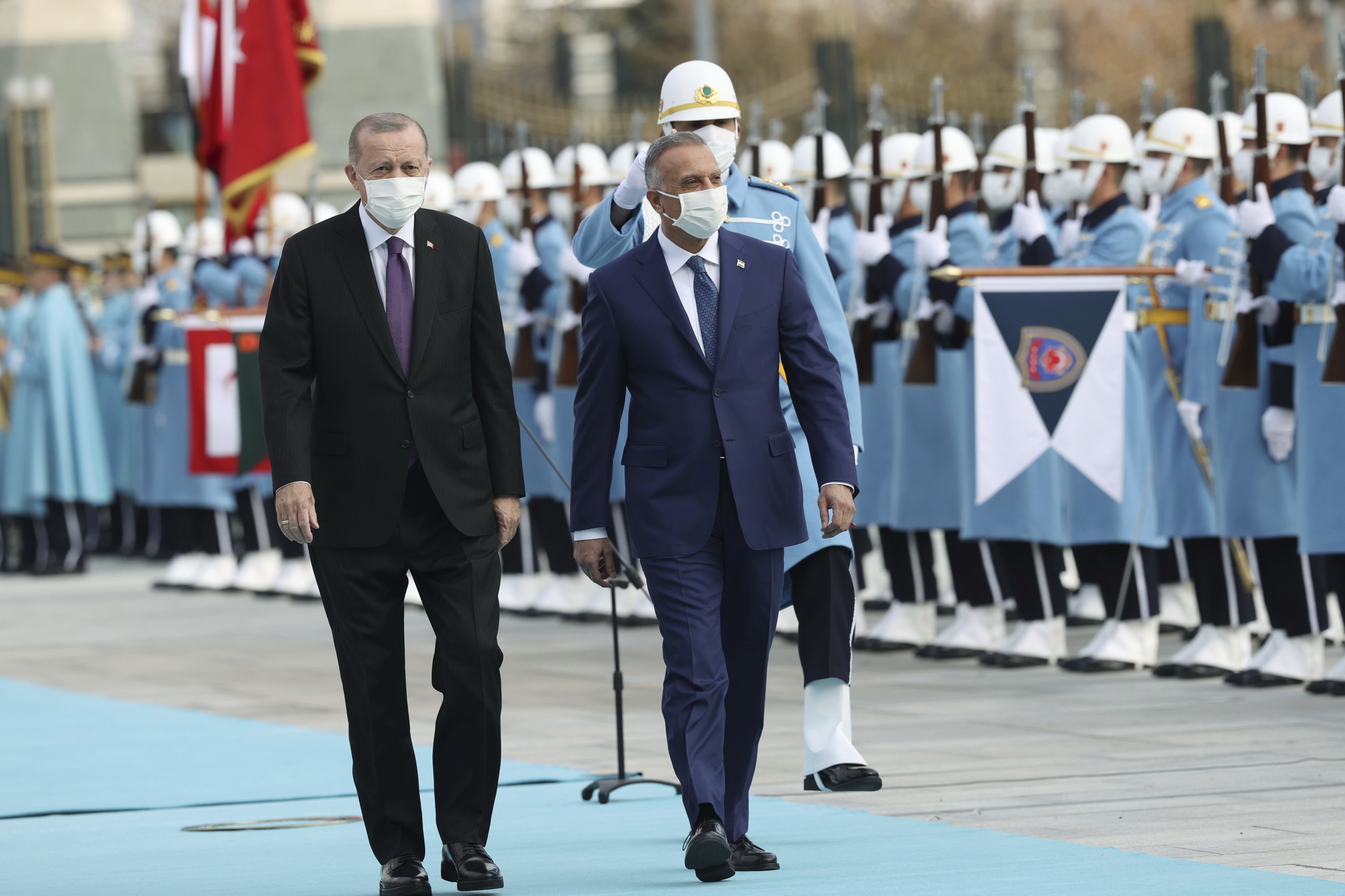 Recep Tayyip Erdogan with Iraqi PM Mustafa Al-Kadhimi during a welcome ceremony, Presidential Compound, Ankara, Turkey, Dec. 17, 2020. (AP Photo)