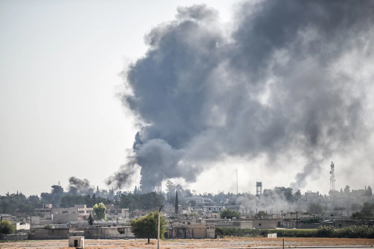 Smoke billows from a fire inside Syria during bombardment by Turkish forces on Oct. 9, 2019 (AFP file photo)