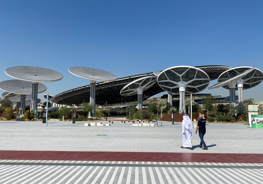 People walk at the site of Dubai Expo 2020 in Dubai, United Arab Emirates, January 16, 2021. (Reuters)