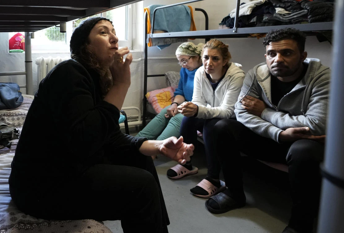 After enduring a decade of war in Syria, Boshra Al-Moallem and her two sisters seized their chance to flee, but the journey proved terrifying and nearly deadly. (AP)