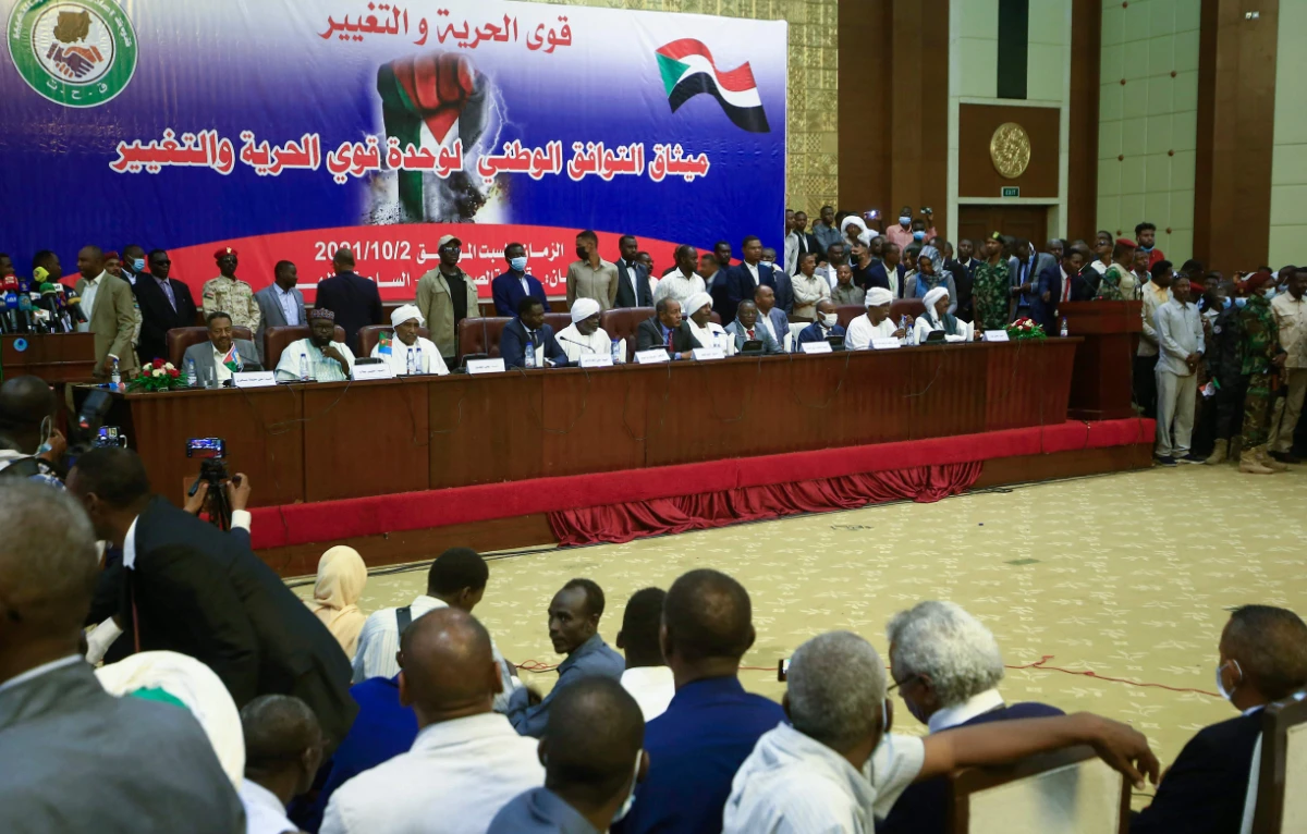People attend a conference entitled the "National Consensus Charter of the Forces of Freedom and Change" in Sudan's capital Khartoum, announcing the formation of an alliance separate from the country's main civilian bloc, on Oct. 2, 2021. (AFP)