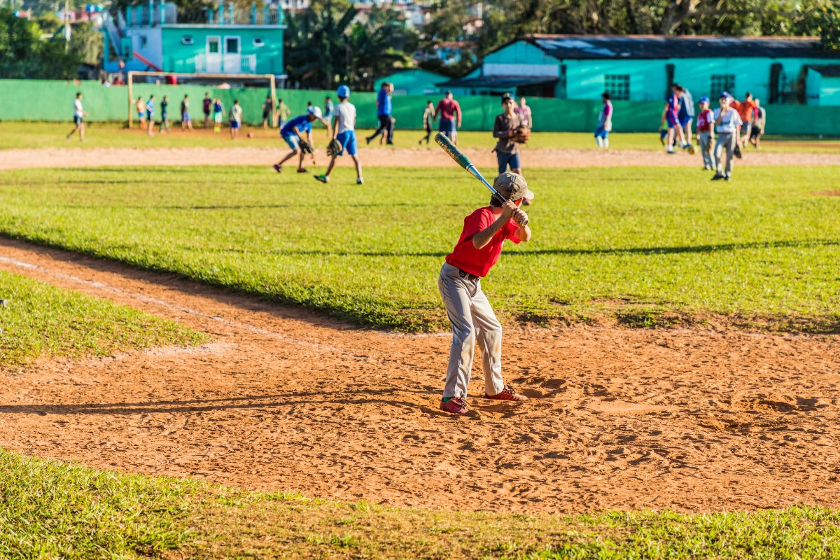 Children play baseball in Vinales, Cuba. The defection of nine players is one of the biggest such losses by a Cuban team playing abroad. (Shutterstock photo)