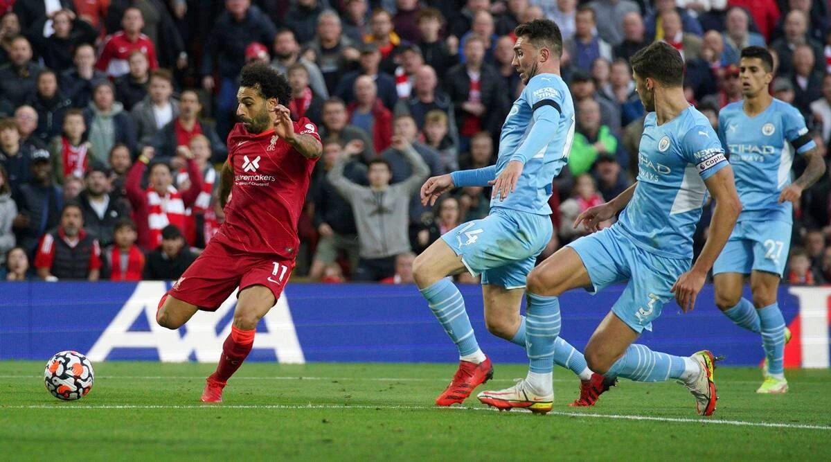 Liverpool's Mohamed Salah scores their side's second goal against Manchester City. (AP)