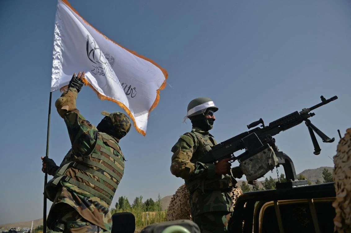 Taliban fighters stand guard near the venue of an open-air rally in a field on the outskirts of Kabul on October 3, 2021. (File/AFP)