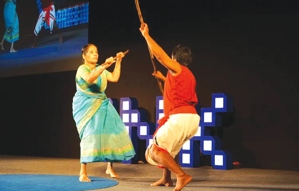 Meenakshi ‘Amma,’ Raghavan, 78, executes the Kalari martial arts technique at the Kadathanad Kalari Sangham school in the southern state of Kerala. (Jaimi R.J)