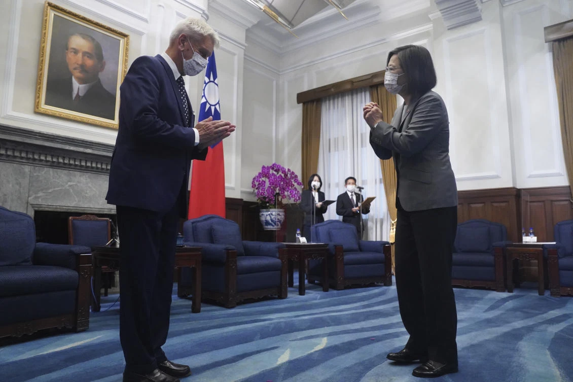 Taiwanese President Tsai Ing-wen, right, gestures as she meets Alain Richard, the head of the French Senate's Taiwan Friendship Group at the Presidential Office in Taipei. Taiwan, Thursday, Oct. 7, 2021. (AP)