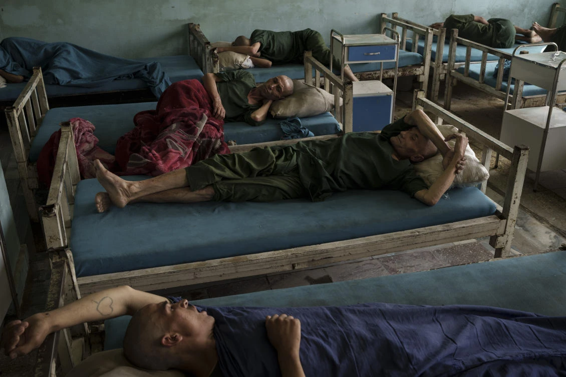 Drug users detained during a Taliban raid rest at the detoxification ward of the Avicenna Medical Hospital for Drug Treatment in Kabul, Afghanistan, Monday, Oct. 4, 2021. (AP)