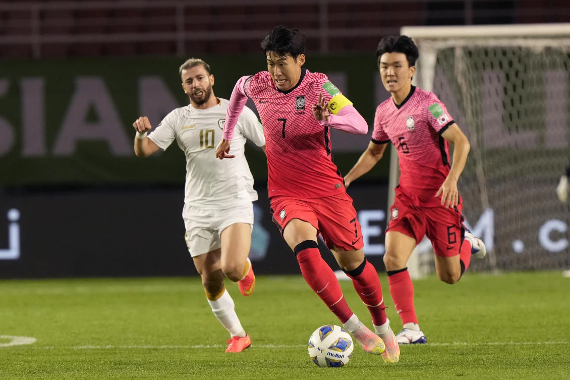South Korea’s Son Heung-min dribbles the ball during the final round of the Asian zone group A qualifying match against Syria for FIFA World Cup Qatar 2022 at Ansan Wa Stadium in Ansan on Thursday. (AP)