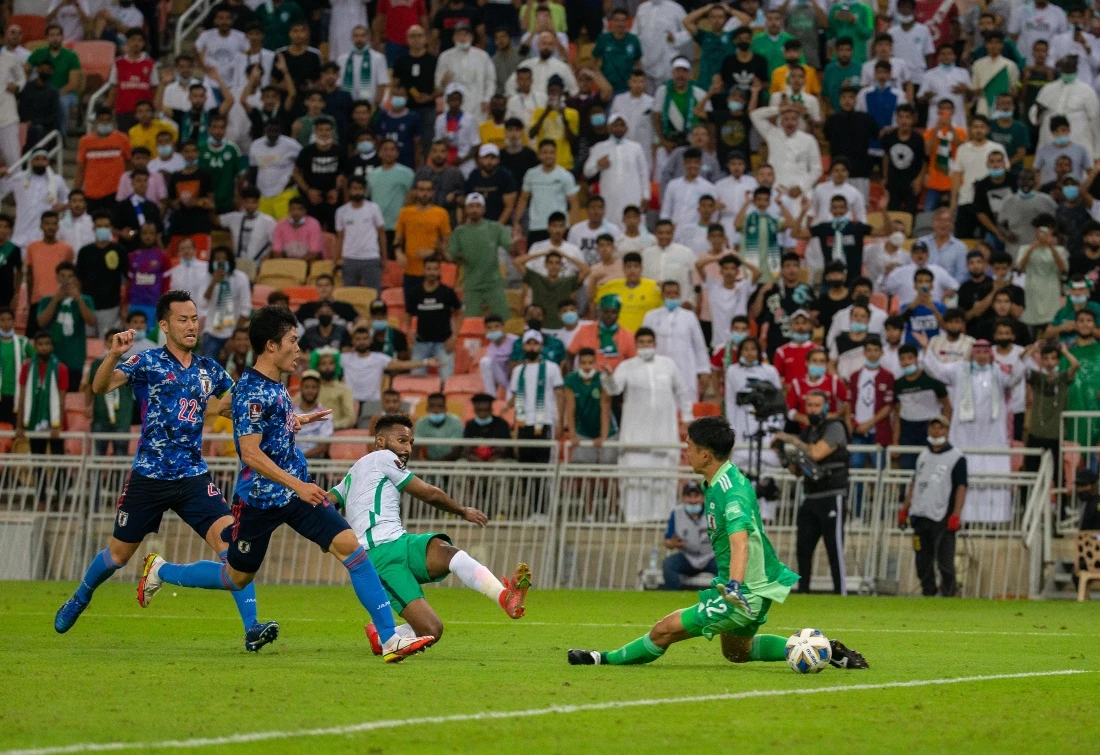 Firas Al-Buraikan scores to secure a famous win for Saudi Arabia over Japan in Jeddah. (Mohammed Al-Mana)