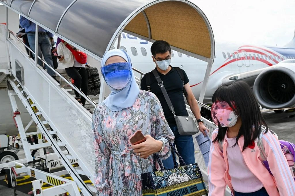 Malaysians who have been fully vaccinated against COVID-19 will be allowed to resume travel. (File/AFP)