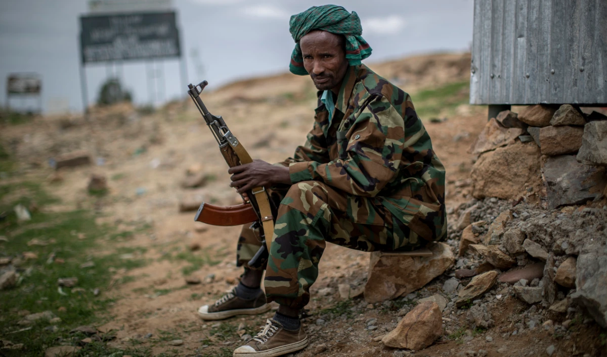 A fighter loyal to the Tigray People's Liberation Front (TPLF) mans a guard post. (AP/File)
