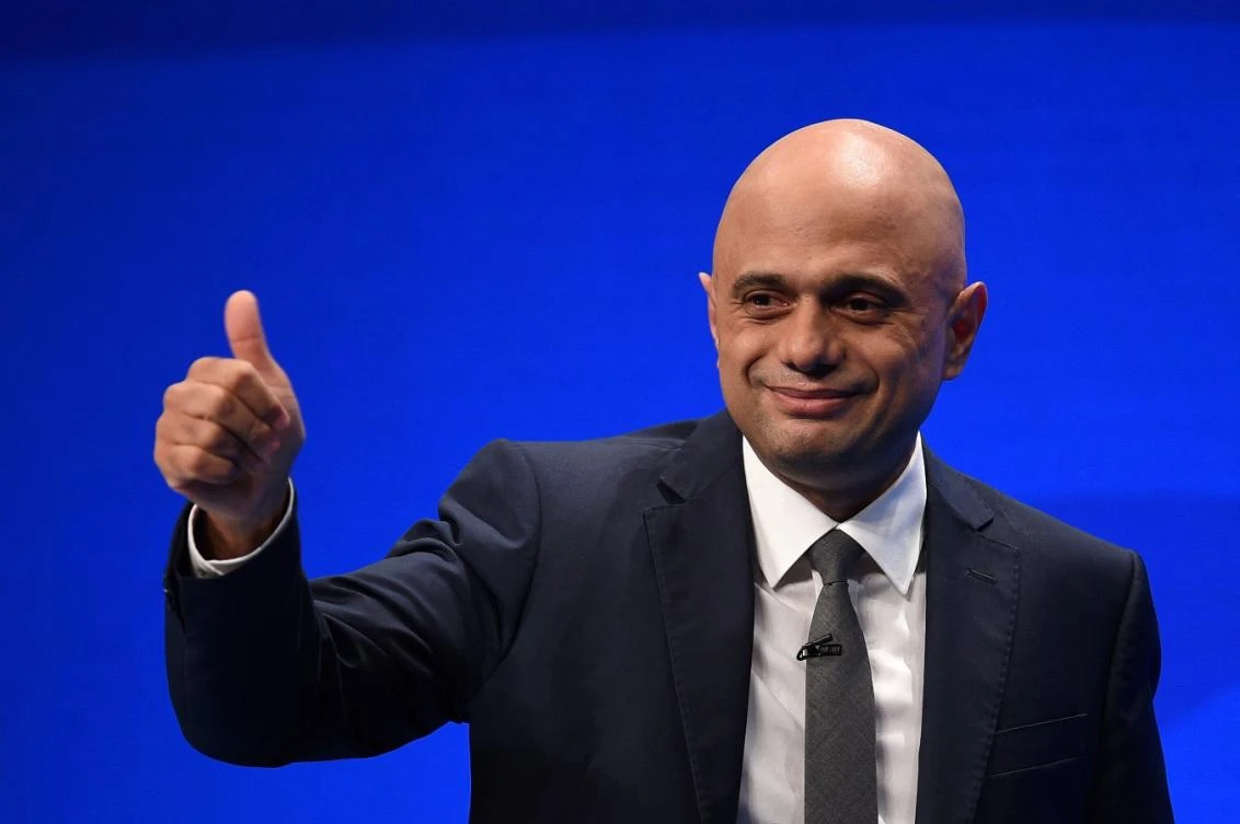 Britain's Health Secretary Sajid Javid gives a 'thumbs up' sign as he leaves the stage after speaking on the third day of the annual Conservative Party Conference. (File/AFP)