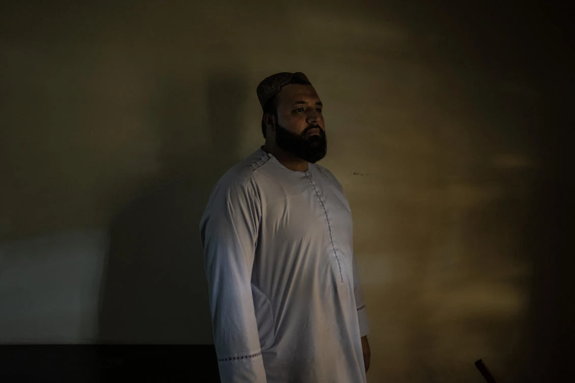 Popal, a British citizen born in Afghanistan, poses for a portrait in Kabul, Afghanistan, Sunday, Sept. 26, 2021. (AP)