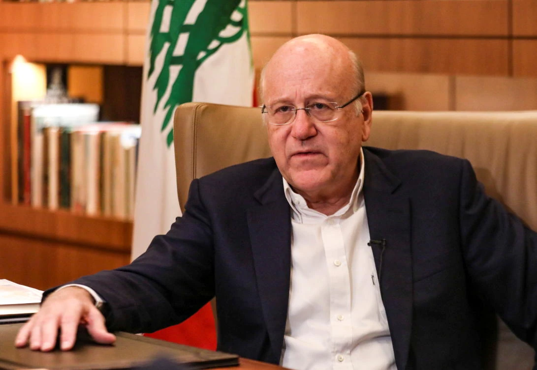 Lebanese Prime Minister Najib Mikati speaks during an interview with Reuters at the government palace in Beirut, Lebanon October 14, 2021. (Reuters)