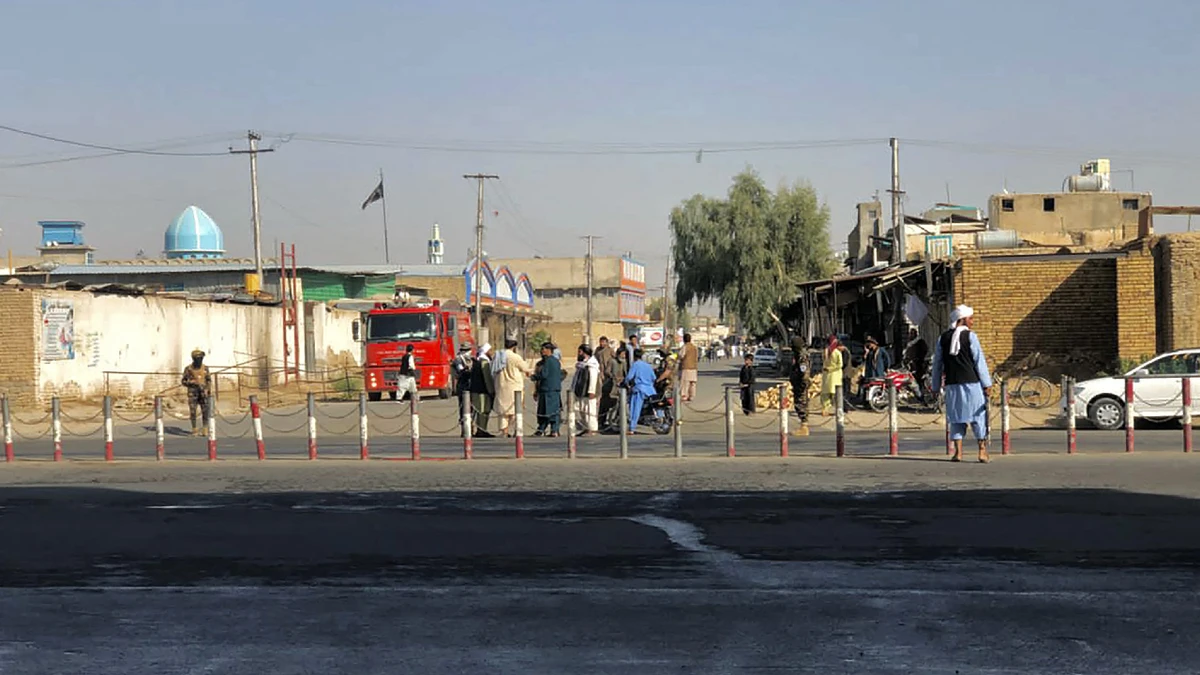 Members of Taliban stand guard near a Shiite mosque in Kandahar province on October 15, 2021. (AFP)