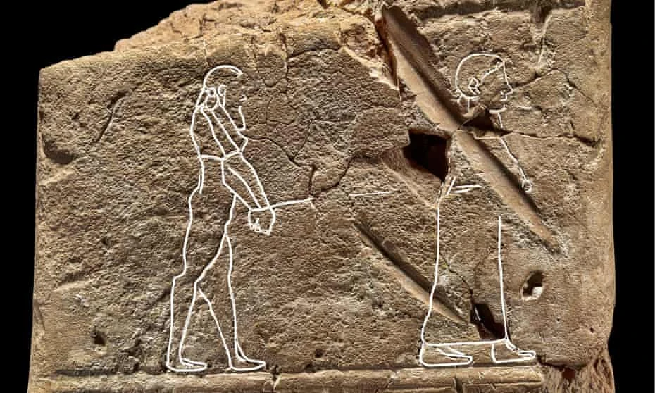 A bearded man being led to the afterlife by a woman on an ancient Babylonian clay tablet. (Photo: The British Museum)