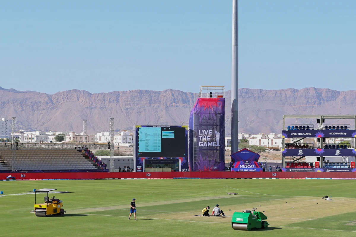 Workers prepare the al-Amerat Cricket Stadium in Oman's capital Muscat on October 16, 2021. (AFP)