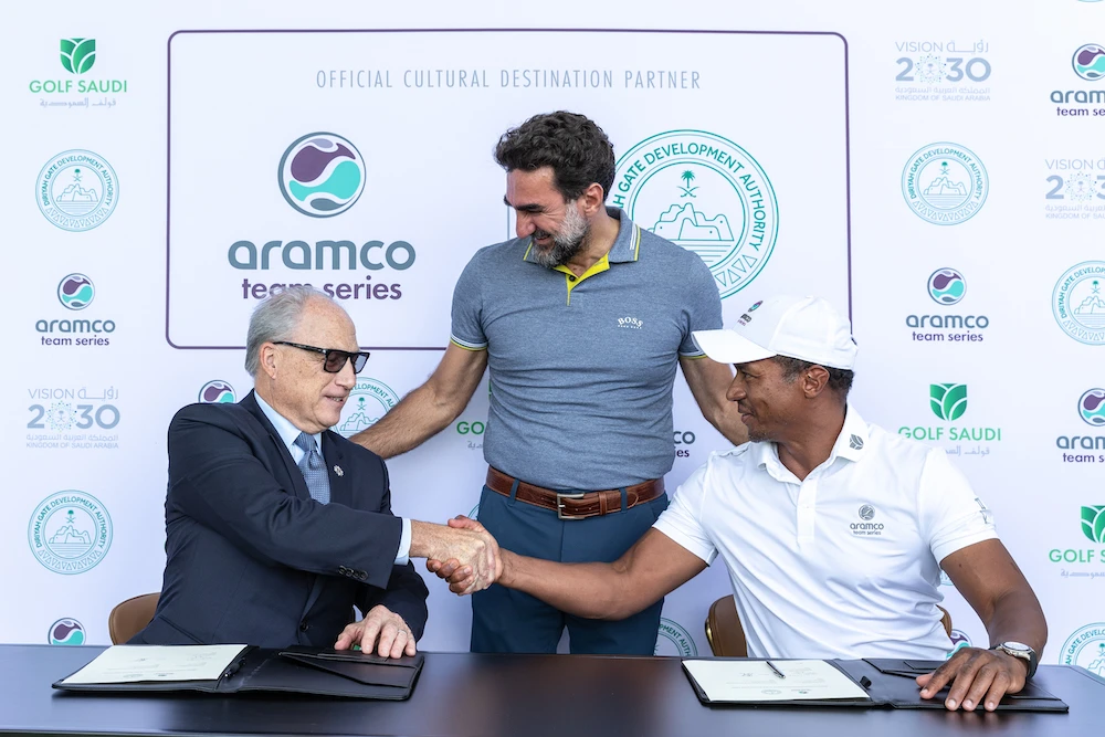 Jerry Inzerillo, left, Group CEO of Diriyah Gate Development Authority, signs the partnership with Aramco team Series. (DGDA)