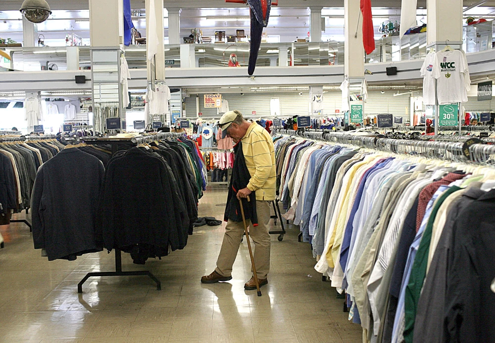 Shopping secondhand can play a role in boosting community development with money usually used to help local charities and businesses. (AFP/File)