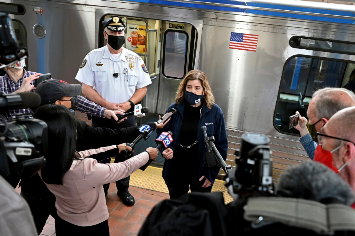 US train riders held up phones as woman was raped, police say