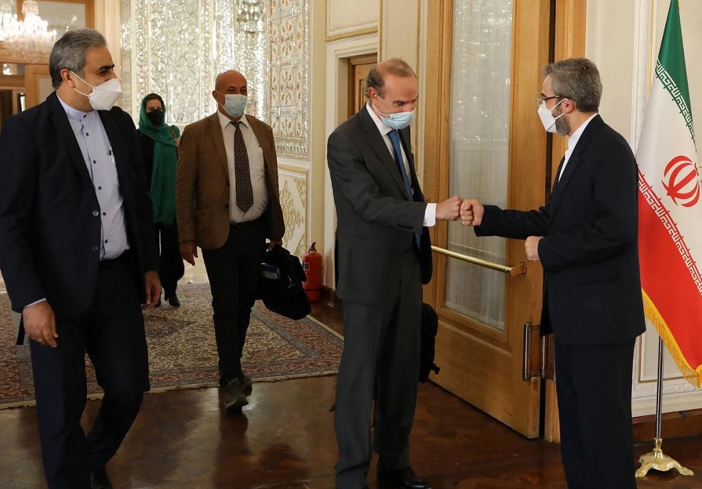 Above, the Iranian foreign ministry welcomes EU political director Enrique Mora, the chief coordinator, in Tehran on Oct. 14, 2021 before their meeting regarding the 2015 nuclear deal. (Iranian Foreign Ministry via AFP)