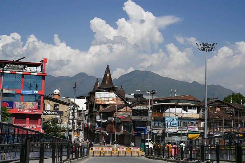 Fences block a road closed in Srinagar on June 4, 2021. (AFP)