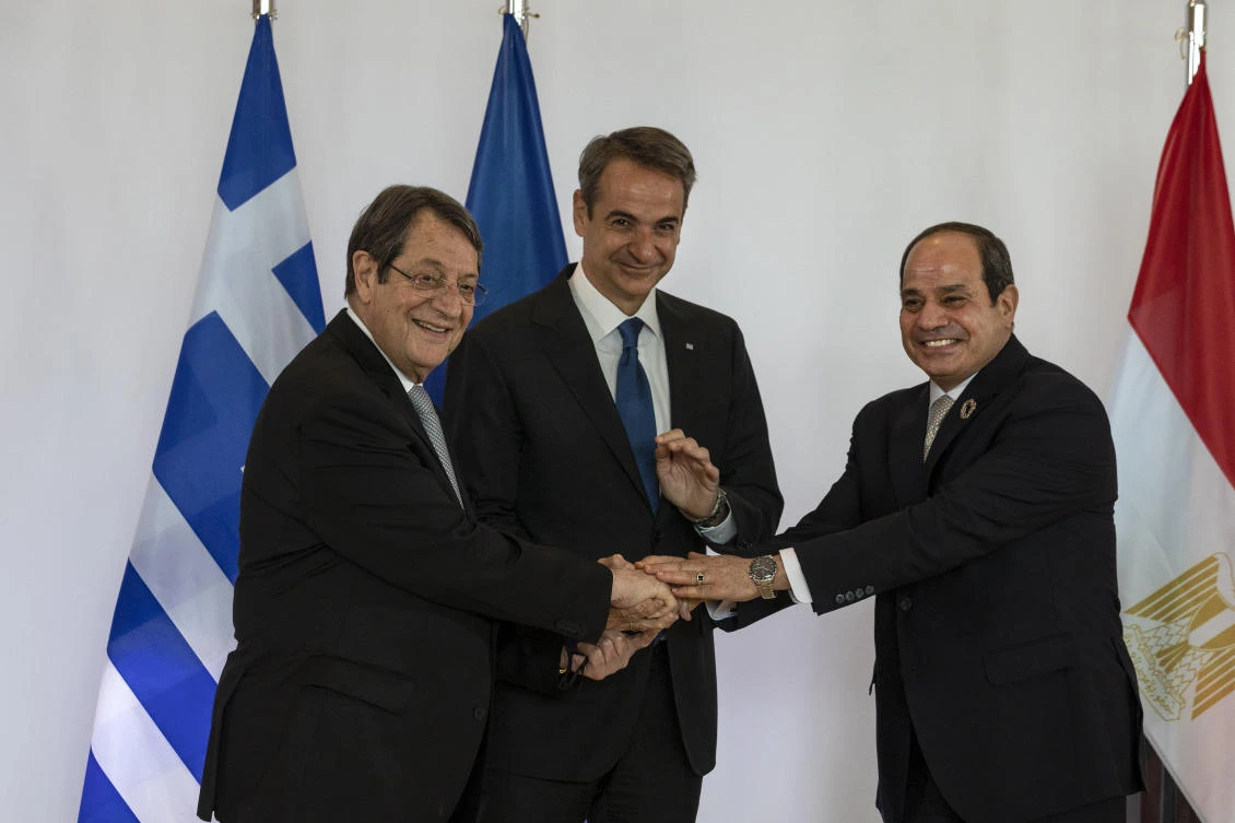 Greece’s Prime Minister Kyriakos Mitsotakis, Cyprus’ President Nicos Anastasiades and Egypt’s President Abdel Fattah El-Sisi meeting on Tuesday in Athens that hosts the 9th trilateral meeting between the three countries. (AP)