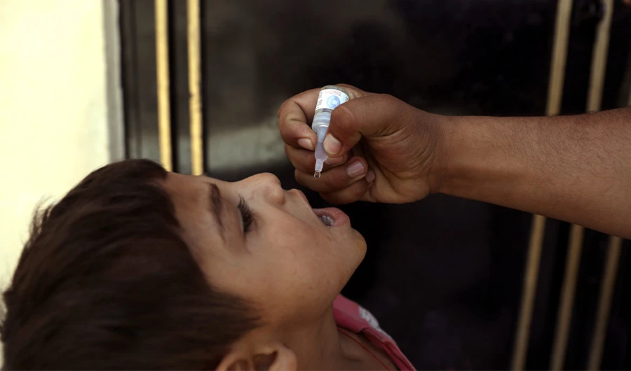 FILE - In this June 15, 2021 file photo, a health worker administers a vaccination to a child during a polio campaign in the old part of Kabul, Afghanistan. (AP)