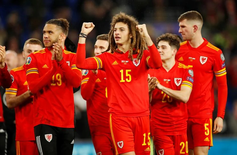 Wales’ Ethan Ampadu and teammates celebrate after defeating Hungary 2 – 0 in a Euro 2020 qualifier at Cardiff City Stadium, Cardiff, Wales, Britain, Nov. 19, 2019. (Reuters)