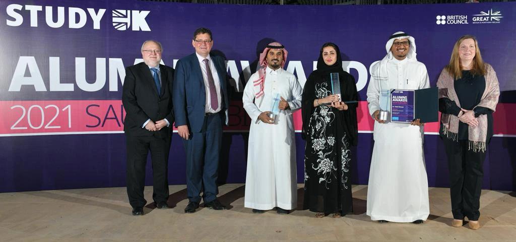Sir Steve Smith, British Ambassador Neil Crompton (from left) with winners in the middle. (Supplied)