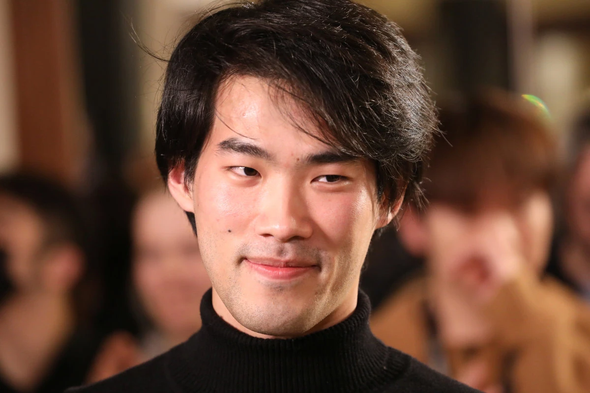 Bruce Xiaoyu Liu of Canada reacts after he was announced the winner of the 18th International Fryderyk Chopin Piano Competition in Warsaw on Oct. 21, 2021. (Maciej Jazwiecki/Agencja Gazeta via REUTERS)