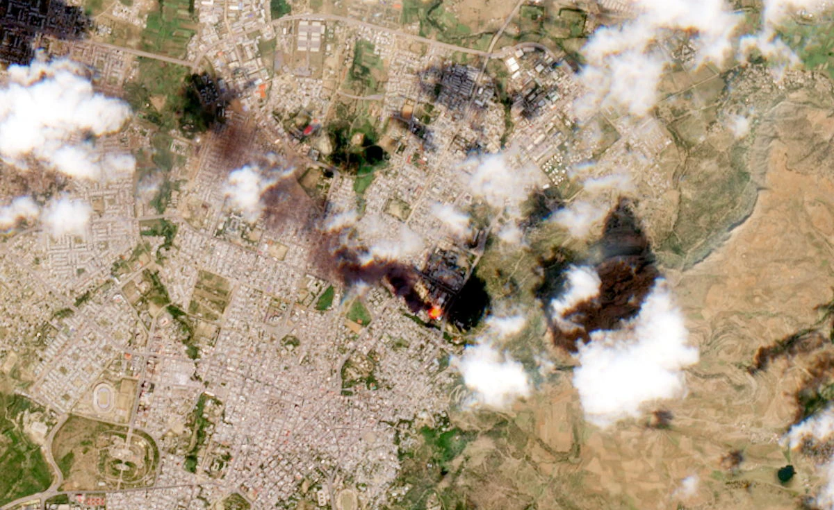 A satellite image shows smoke rising from Mekelle, Ethiopia, October 20, 2021. (File/Reuters)
