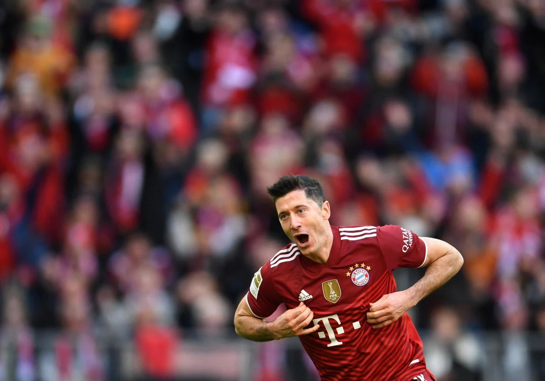 Bayern Munich’s Robert Lewandowski celebrates scoring their second goal in their Bundesliga match against TSG 1899 Hoffenheim at the Allianz Arena in Munich on Saturday. (Reuters)