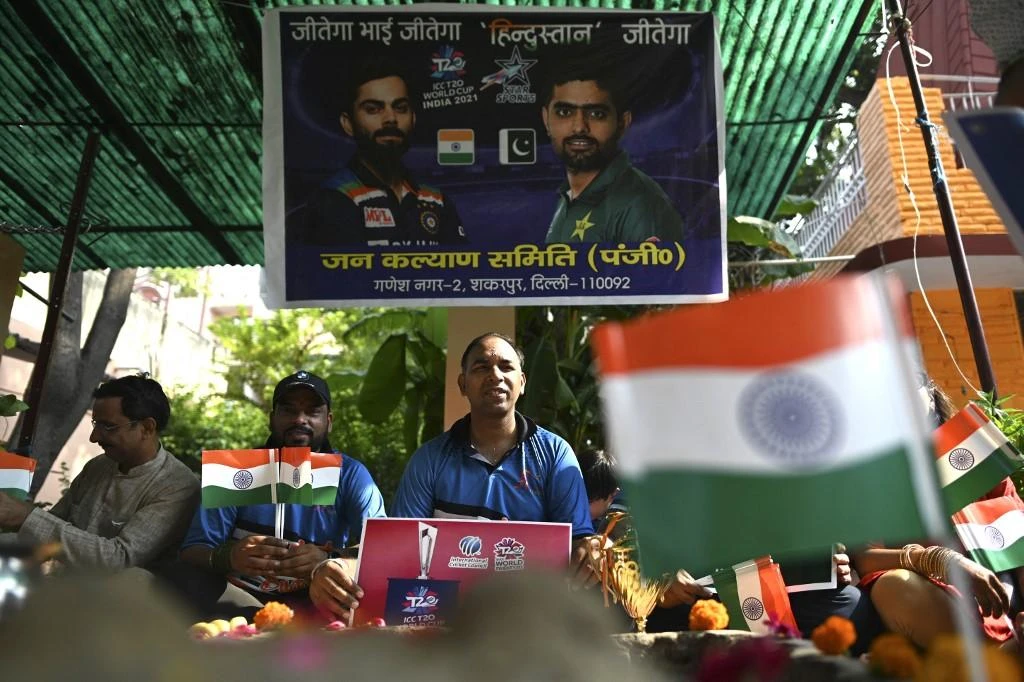 Indian cricket fans in New Delhi perform prayers wishing the victory of their team ahead of their ICC T20 World Cup 2021 match against Pakistan in Dubai on Oct. 24, 2021. (AFP)