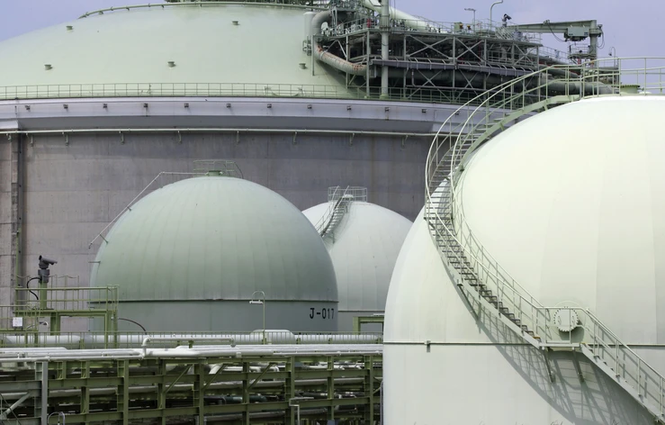 Liquefied natural gas (LNG) tanks stand at a terminal in Takaishi City, Osaka, Japan. Getty Images