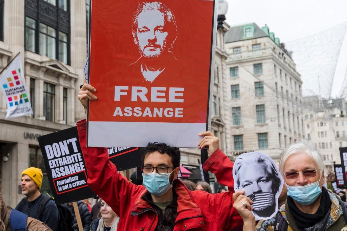 Protesters call for the release of Wikileaks founder Julian Assange, who is on remand and fighting extradition to the US, outside BBC Broadcasting House, London, England, Oct. 23, 2021. (EPA)