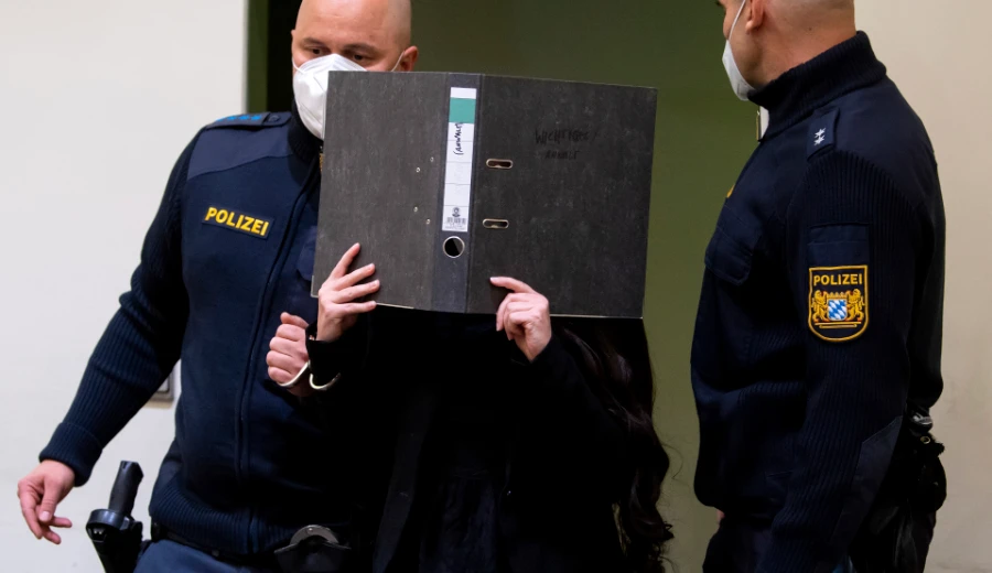 Defendant Jennifer W. arrives in a courtroom for her trial in Munich, Germany, Monday, Oct. 25, 2021. (AP)